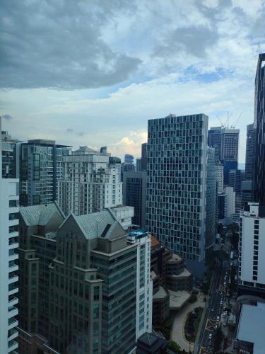 a view of a large city with tall buildings at Vortex Residenc klcc serviced apartment near by Bukit Bintang in Kuala Lumpur