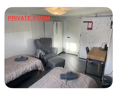 Ένα ή περισσότερα κρεβάτια σε δωμάτιο στο Private room with shared bathroom and kitchen
