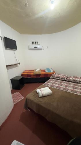Cama o camas de una habitación en Pousada Capitólio 04 Canoa Quebrada