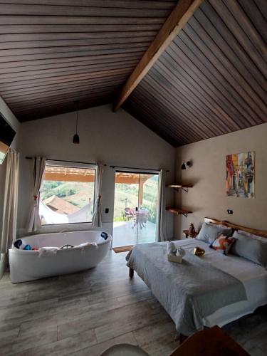 Postel nebo postele na pokoji v ubytování REFUGIO PIEMONTE Chalés