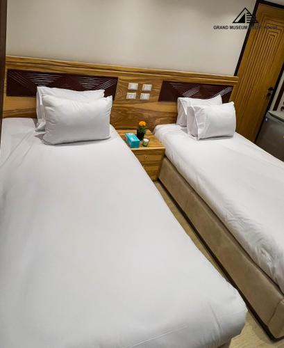 Cama o camas de una habitación en Grand museum & pyramids view inn