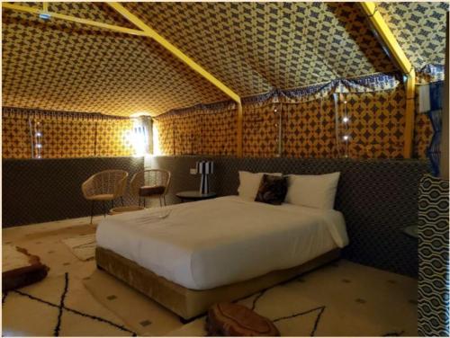 Ένα ή περισσότερα κρεβάτια σε δωμάτιο στο Arabian Desert Home