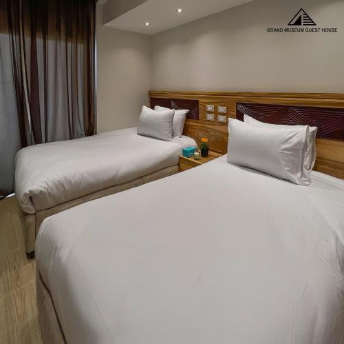 Cama o camas de una habitación en Grand museum & pyramids view inn