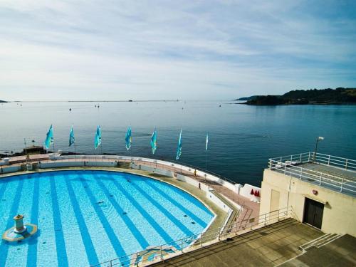 a large swimming pool on a cruise ship in the water at Imperial Plymouth in Plymouth