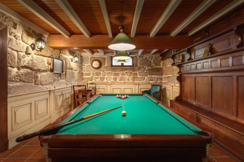 a billiard room with a pool table in it at Foz Townhouse- Sea, Garden & Garage in Porto