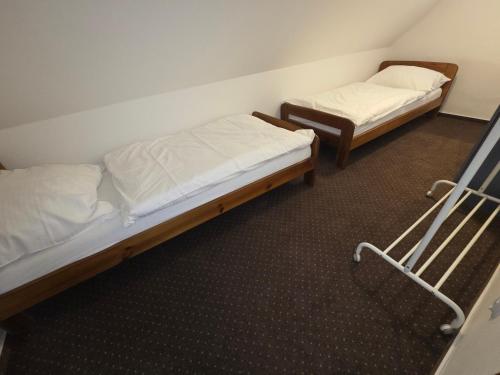 Postel nebo postele na pokoji v ubytování Apartmány Orlová