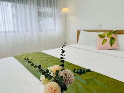 Postel nebo postele na pokoji v ubytování Minh Anh Apartment