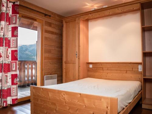 Ένα ή περισσότερα κρεβάτια σε δωμάτιο στο Duplex 1 pièce 6 pers avec balcons, parking - Pra Loup 1500 - FR-1-504-167