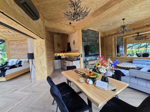 Posezení v ubytování Sobiczkowy Dwór Apartament - Giewont Premium DeLuxe & SPA