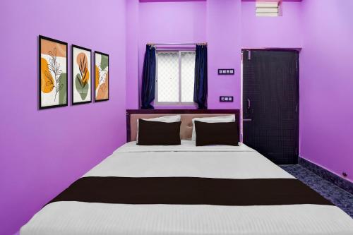 Postel nebo postele na pokoji v ubytování Hotel O Srinath palace