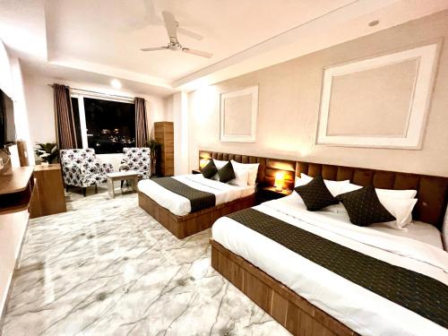 Cama o camas de una habitación en Hotel La Meridian - Rishikesh Road, Haridwar