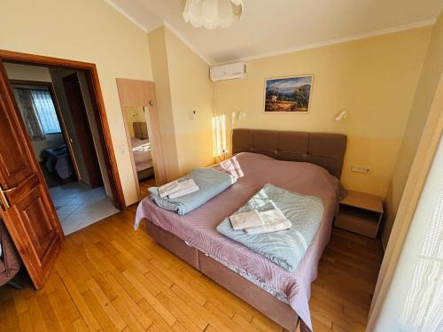 a bedroom with a bed in a room at Casa Cino in Umag