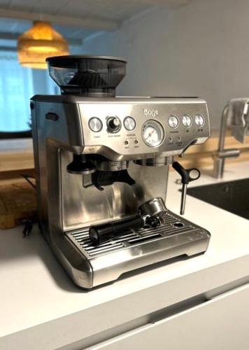 Kemudahan buat kopi dan teh di Appartement Centre Ville