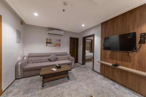 TV a/nebo společenská místnost v ubytování Gardenia Park Alzahraa