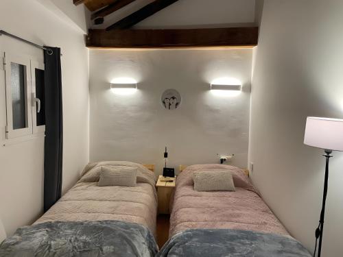 Ένα ή περισσότερα κρεβάτια σε δωμάτιο στο Casa do Terrado