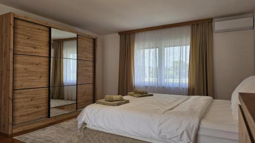 Postel nebo postele na pokoji v ubytování Villa Ljiljan