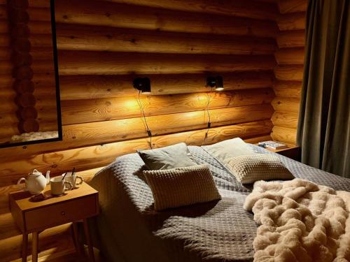 Atmospheric log cabin by the ski tracksにあるシーティングエリア