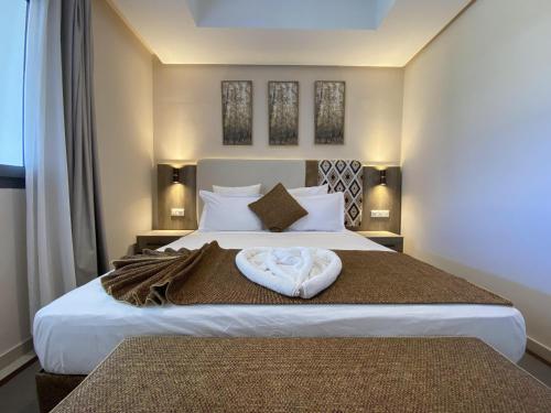 Ένα ή περισσότερα κρεβάτια σε δωμάτιο στο appartement alhoceima vip sfiha
