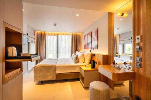 a hotel room with a bed and a sink at ERK Hotel in Istanbul
