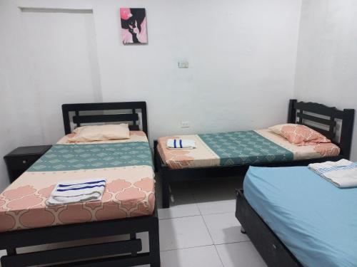 Ένα ή περισσότερα κρεβάτια σε δωμάτιο στο Apartamento Familiar Torices