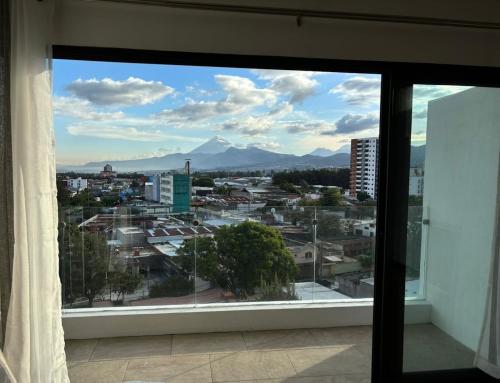 Modern apartment with a view of volcanoes