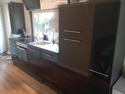 Kuchyň nebo kuchyňský kout v ubytování Chaletpark Kempenbos - 112