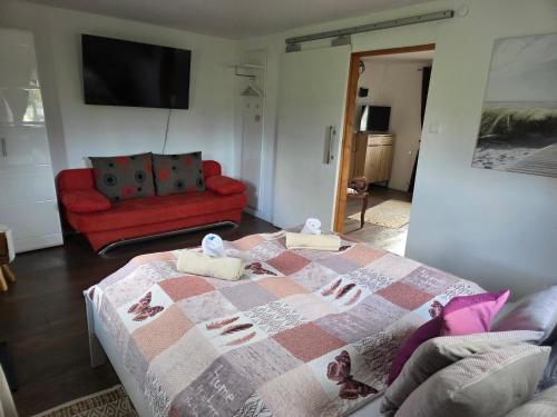 Postel nebo postele na pokoji v ubytování Alexandra Appartement