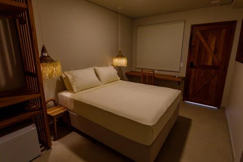 Кровать или кровати в номере Casa Savana Suítes