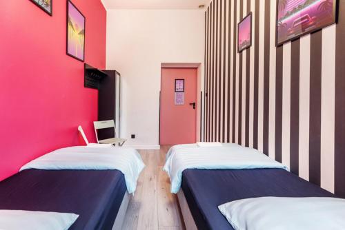 Ένα ή περισσότερα κρεβάτια σε δωμάτιο στο VICE CITY Hostel