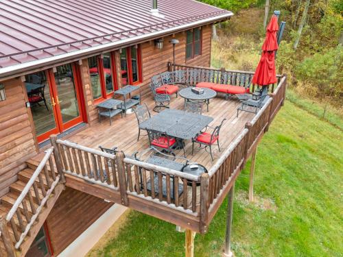 an overhead view of a deck with a table and chairs at Family Mountain Escape w Private Suite Modern Comforts in Old Fields