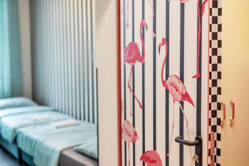 Ένα ή περισσότερα κρεβάτια σε δωμάτιο στο VICE CITY Hostel