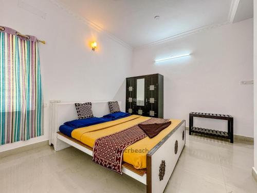 Un pat sau paturi într-o cameră la Coastal Green resort