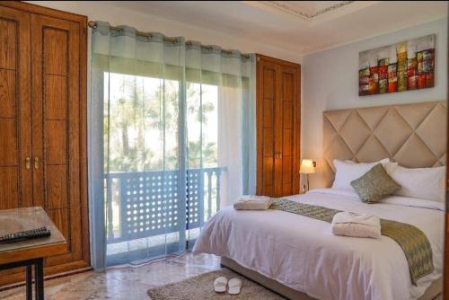 Postel nebo postele na pokoji v ubytování Villa Premium Marrakech