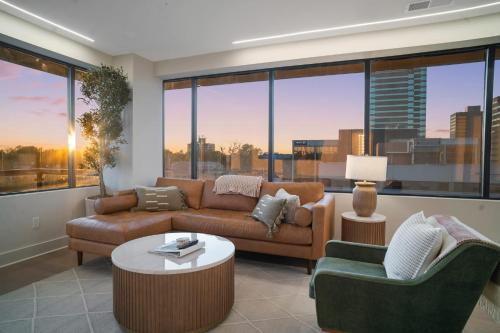 a living room with a couch and two chairs at Thoroughbred Retreat Unit 803 in Lexington