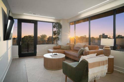 a living room with a couch and a table at Thoroughbred Retreat Unit 803 in Lexington