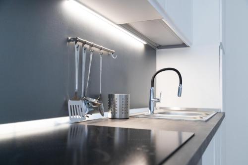 Η κουζίνα ή μικρή κουζίνα στο CARPI SUITE - Lorca House