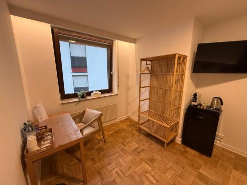 Μια τηλεόραση ή/και κέντρο ψυχαγωγίας στο Colleen Apartments Wesertal