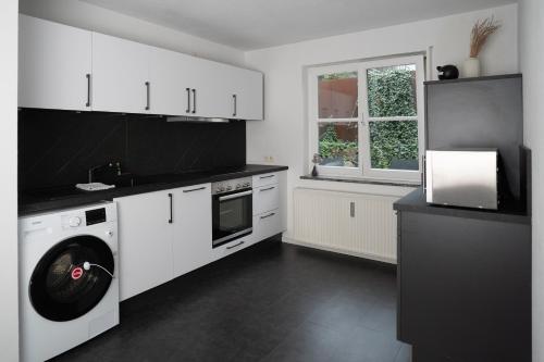 Η κουζίνα ή μικρή κουζίνα στο Lo Ferienwohnung