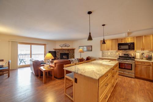 a kitchen and living room with a couch and a table at 1 Mi to Main Street Mtn-View Home in Frisco in Frisco