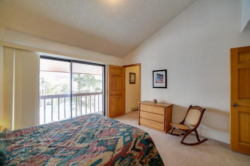 a bedroom with a bed and a chair and a window at 1 Mi to Main Street Mtn-View Home in Frisco in Frisco