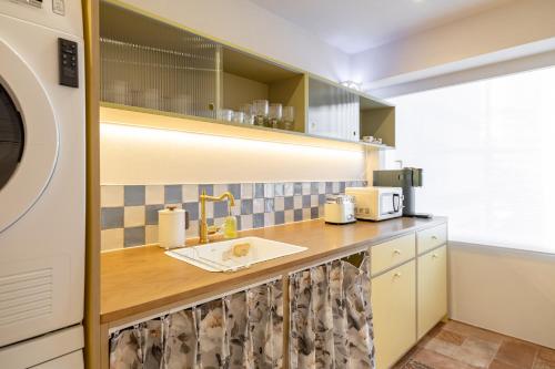 Cuisine ou kitchenette dans l'établissement EXTAY Mansion Chungmuro