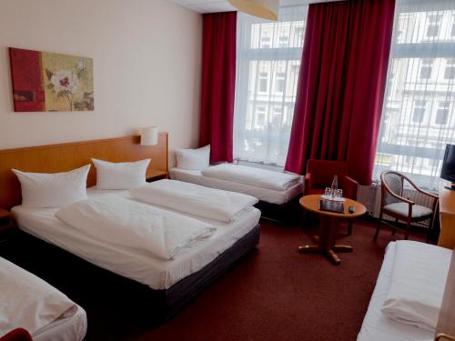 Hotel Residence am Hauptbahnhof tesisinde bir oda