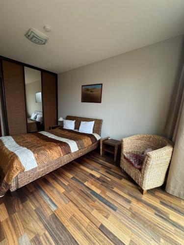 Postel nebo postele na pokoji v ubytování Two-bedroom apartment in central Palanga