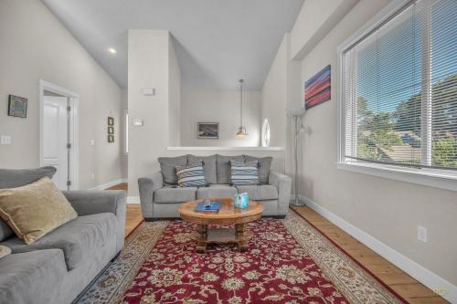 a living room with two couches and a coffee table at Family Tides in Lincoln City