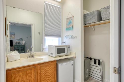 a bathroom with a sink and a microwave at Pacific Plaza #505 - Coastal Gem - StudioD-Q in Oceano