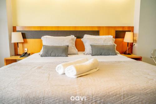 Postel nebo postele na pokoji v ubytování Interatlântico by Qavi