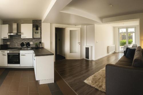 Kuchyň nebo kuchyňský kout v ubytování Moderne Ferienwohnung Klosterblick