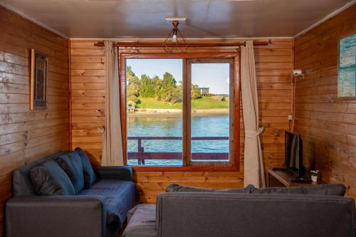 Posezení v ubytování Cabanas Palafitos Dalmacia
