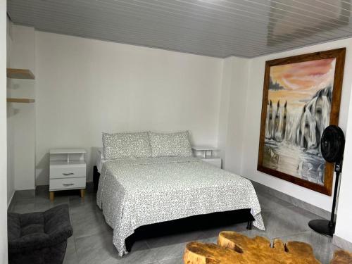 Ein Bett oder Betten in einem Zimmer der Unterkunft Casa Hotel Anturio