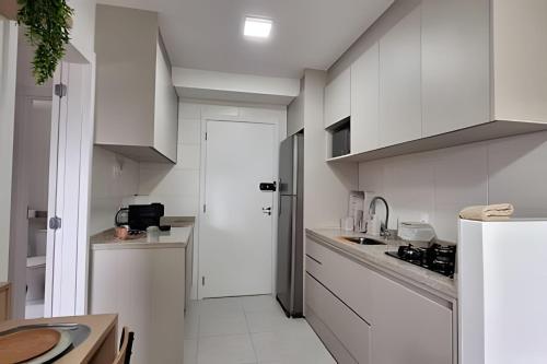 Cuisine ou kitchenette dans l'établissement A 511 - Apê 1 dormitório - Cama Queen - Tókio Marine Hall